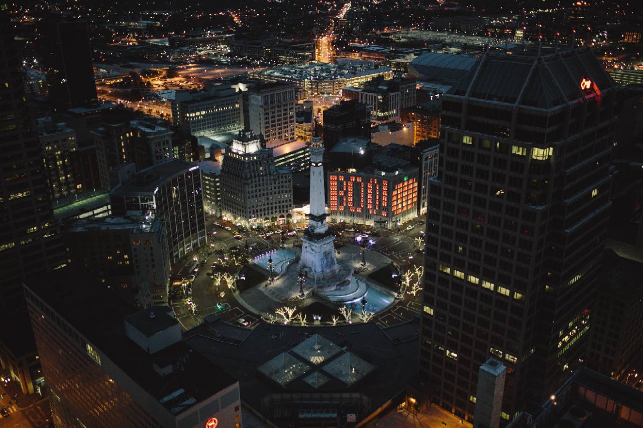 Monument Circle and downtown Indianapolis illuminated at night
